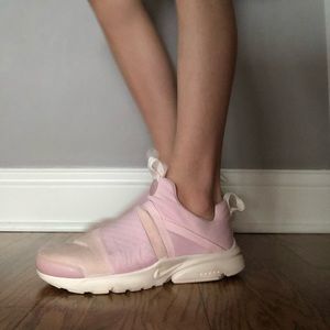 Pink nike up on shoes